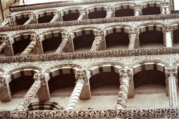 Scan10027.JPG - Elaborately decorated pillars of the facade of Duomo San Martino